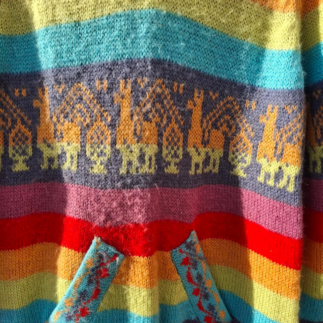 Colourful Multi-Coloured Rainbow Alpaca Wool Poncho With Fringed Hem. - Festigal