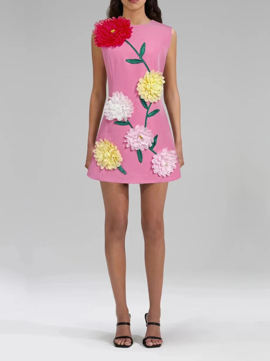 Pink dress with floral patterns on a plain background